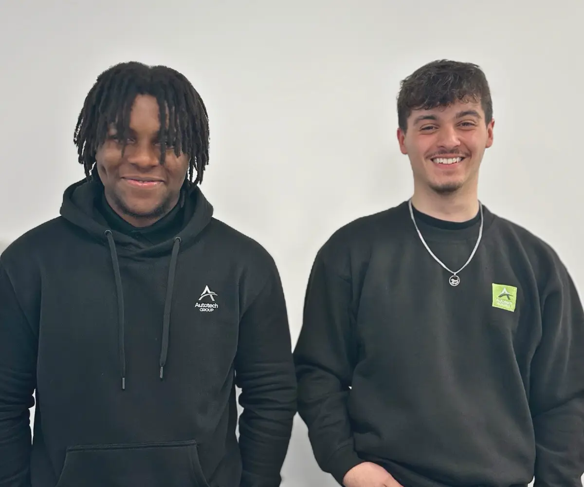 Two Autotech Group Apprentices working in the office